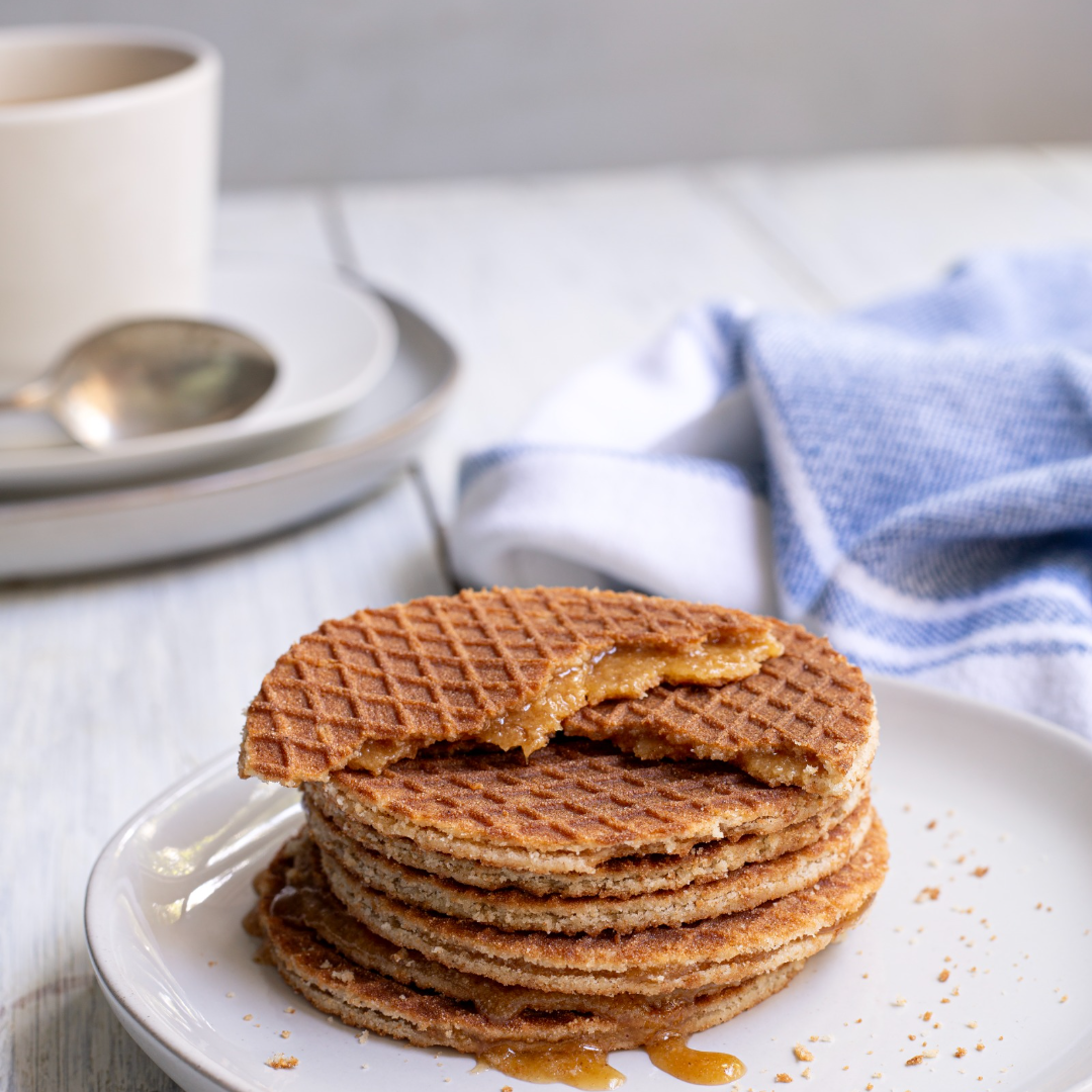 half eaten gluten free stroopwafels on plate 